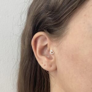 Piercing Pino e Lua com Estrela